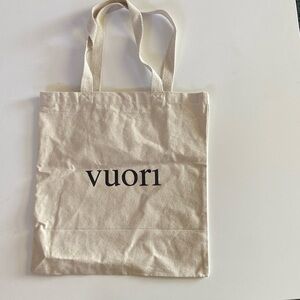 Vuori Cream Canvas Tote Bag. The Rise. The Shine.